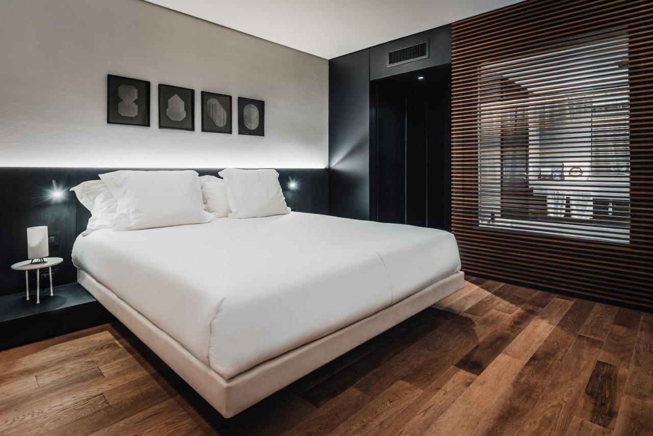 Sls Buenos Aires Puerto Madero Exterior foto A bedroom at the hotel