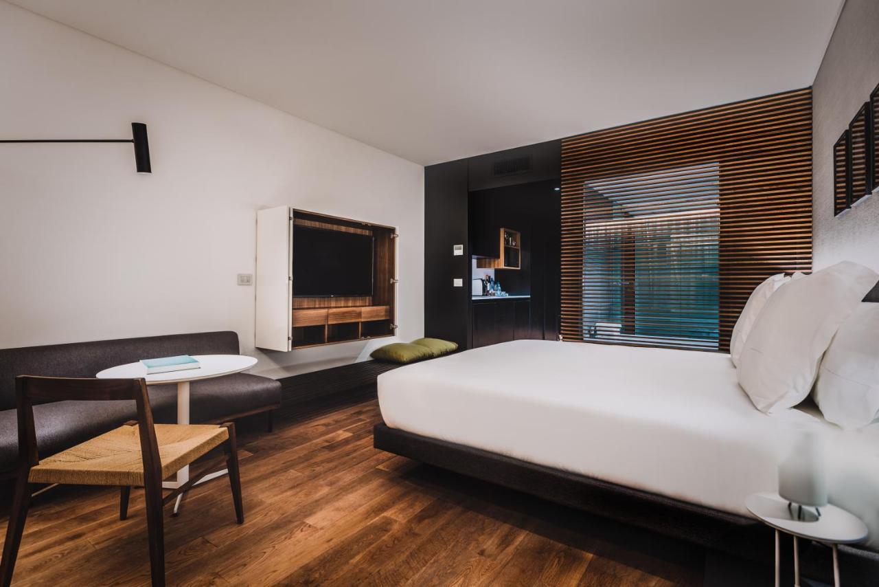 Sls Buenos Aires Puerto Madero Exterior foto A room at the hotel