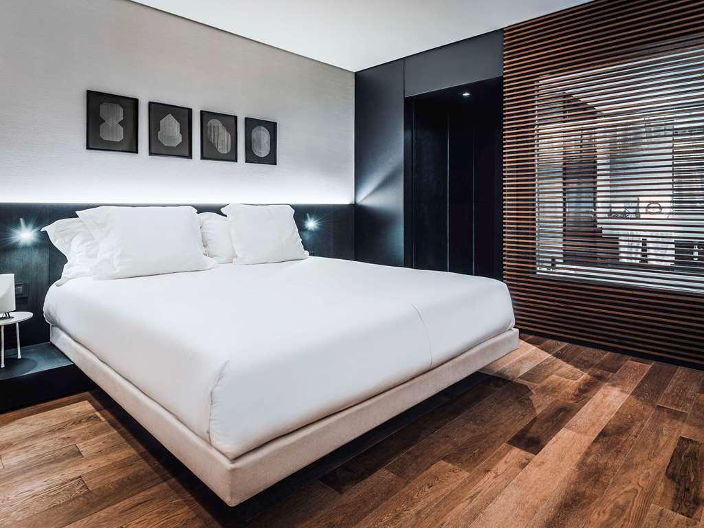 Sls Buenos Aires Puerto Madero Quarto foto A bedroom at the hotel